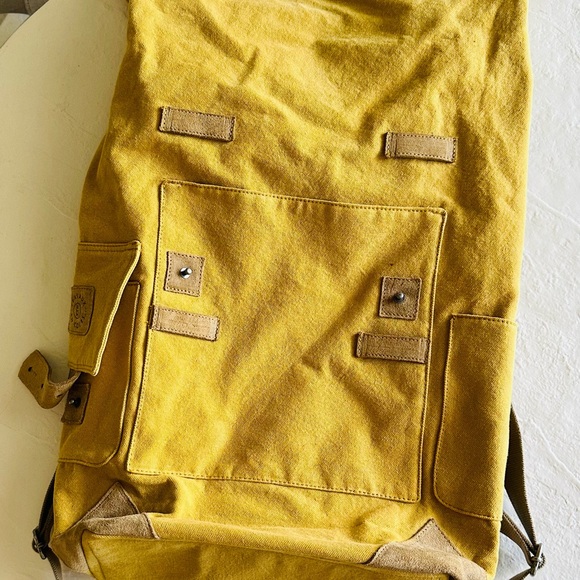 Tannish yellow fold over backpack made -heavy duty fabric, tan suede accents - Picture 4 of 4